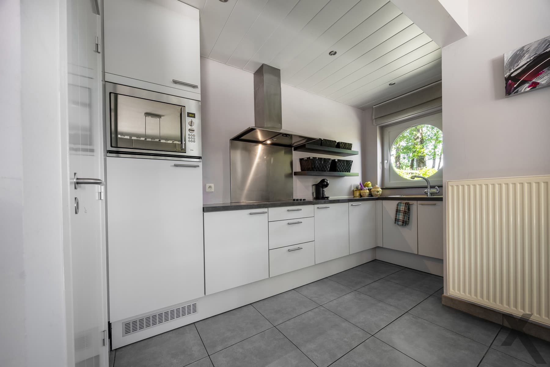 Mooi gelijkvloers hoekappartement met terras en tuintje — foto 7